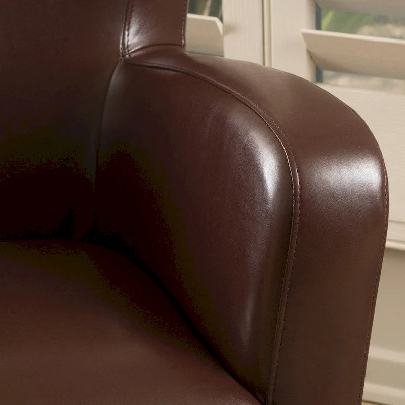 Fauteuil décoratif pivotant à dossier ailé en cuir contrecollé