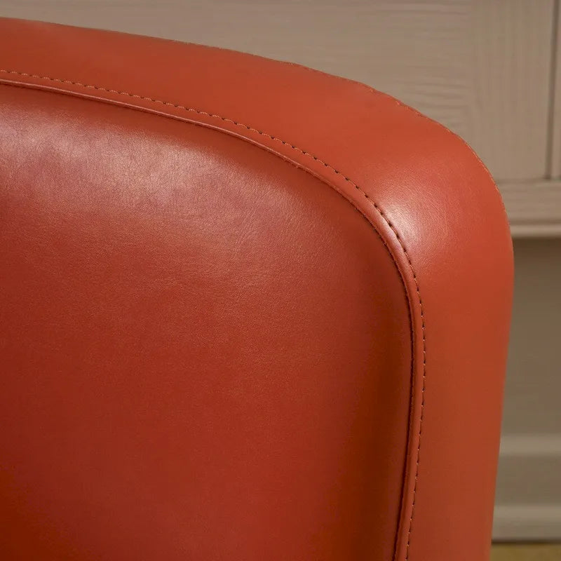 Fauteuil décoratif pivotant à dossier ailé en cuir contrecollé