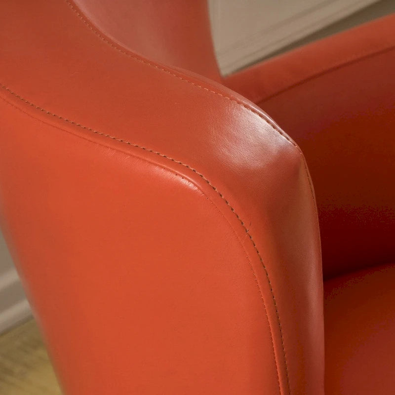 Fauteuil décoratif pivotant à dossier ailé en cuir contrecollé